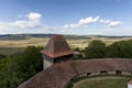 The beautiful little village of Viscri and the castle in the heart of rural Romania countryside in Transylvania on the top of the Royalty Free Stock Photo