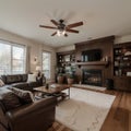 Beautiful living room with hardwood floors, fireplace and couch in new luxury home