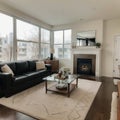 Beautiful living room with hardwood floors, fireplace and couch in new luxury home