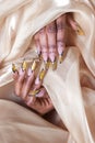 Beautiful long designer nails , nails for exhibitions, french manicure Royalty Free Stock Photo