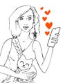 Beautiful long hair girl with smart phone and a cute cat on her Royalty Free Stock Photo