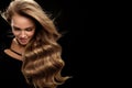 Beautiful Long Hair. Woman Model With Blonde Curly Hair Royalty Free Stock Photo