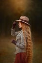 Beautiful long-haired blonde young woman in English style portrait Royalty Free Stock Photo