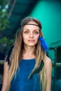 Girl with feathers in her hair Royalty Free Stock Photo