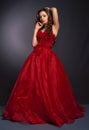 Beautiful long haired woman in red dress Royalty Free Stock Photo