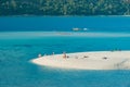 Beautiful long shot of sand dune white sandy beach and blue calm