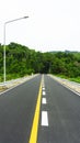 Beautiful long street roads through the jungle at Bang Wad Dam, Phuket city Thailand.