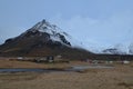 Village of Arnastapi at the Base of Mount Stapafell