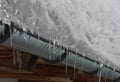 Beautiful lot of snow and icicle and roof of the house Royalty Free Stock Photo