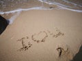 I love you a message on the sandy beach for lovely couple Royalty Free Stock Photo