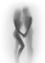 Beautiful lover couple body silhouette together, behind a diffuse surface Royalty Free Stock Photo