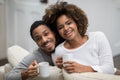 Beautiful loving black spouses drinking coffe at home Royalty Free Stock Photo