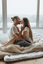 Beautiful loving couple kissing in bed Royalty Free Stock Photo