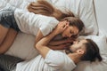 Beautiful loving couple kissing in bed Royalty Free Stock Photo