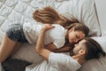 Beautiful loving couple kissing in bed Royalty Free Stock Photo