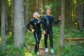 Beautiful loving couple posing in latex rubber costumes