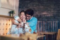 Beautiful loving couple sitting in a cafe drinking coffee Royalty Free Stock Photo