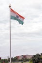 Beautiful Low angle shot of Indian flag with residential apartments and sky in the background. Independence day concept Royalty Free Stock Photo