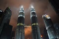 Beautiful low angle shot of the Petronas Twin Towers located in Kuala Lumpur, Malaysia Royalty Free Stock Photo