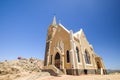 Beautiful low angle view of the protestant german colonial church Felsenkirche in LÃÂ¼deritz / Luderitz in Namibia,