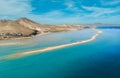 Beautiful low level aspect aerial panoramic view of the beautiful beach, lagoon and sand dunes at Sotavento on Fuerteventura Royalty Free Stock Photo