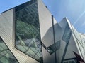 Beautiful low nagle shot of the Royal Ontario Museum under a bright sky on a sunny day in Toronto