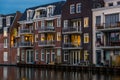 Beautiful and luxurious terraced houses at the canal, Dutch city architecture by night, Alphen aan den Rijn, The Netherlands Royalty Free Stock Photo