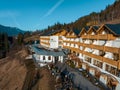 Beautiful luxury Alpine hotel on top of the mountain during spring time.