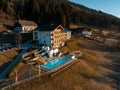 Beautiful luxury Alpine hotel on top of the mountain during spring time.