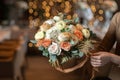 Beautiful luxury bouquet of mixed flowers in woman hand. the work of the florist at a flower shop. Wedding Royalty Free Stock Photo