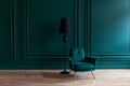 Beautiful luxury classic blue green clean interior room in classic style with green soft armchair. Vintage antique blue Royalty Free Stock Photo