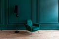 Beautiful luxury classic blue green clean interior room in classic style with green soft armchair. Vintage antique blue-green Royalty Free Stock Photo