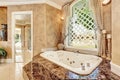 Beautiful luxury marble bathroom interior in beige color Royalty Free Stock Photo