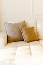 Beautiful luxury pillow on sofa decoration in livingroom interior Light brown and beige colors Royalty Free Stock Photo