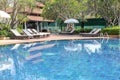 Beautiful luxury swimming pool in tropical hotel pool resort Royalty Free Stock Photo
