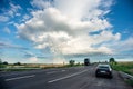 Highway With A Big Truck And Luxury Vehicle Parked