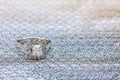 Beautiful and luxury wedding diamond ring on silver background with copy space Royalty Free Stock Photo