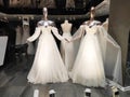 Beautiful luxury white wedding dresses on sale in the shop window