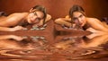 Beautiful lying twins sisters women in a spa salon with water re