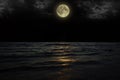 Beautiful magic blue night sky with clouds and full moon stars reflexion in water Royalty Free Stock Photo