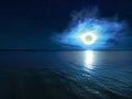 Beautiful magic blue night starry sky with clouds and full moon with reflexion of moonlight in the water Royalty Free Stock Photo