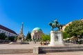 The beautiful main square of Pecs Hungary with dzsami mosque and statues Royalty Free Stock Photo
