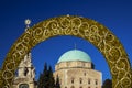 The beautiful main square of Pecs Hungary with dzsami mosque and trinity statue with golden arch