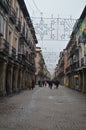 Beautiful Main Street Over Soportal On A Rainy Day In Alcala De Henares. January 1, 2014. Alcala De Henares, Madrid, Spain. Street