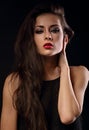 Beautiful makeup female model with smoky makeup and red lipstick Royalty Free Stock Photo