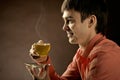 Beautiful man with tea Royalty Free Stock Photo