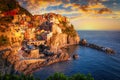 Beautiful Manarola town over the Ligurian Sea at sunset, Italy