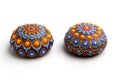 Beautiful mandala hand painted on the stones, isolated