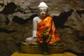 Beautiful marble Buddha statue inside sacred Bayin Nyi Cave