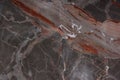 Beautiful marble with pink and red veins, called Caravaggio Royalty Free Stock Photo